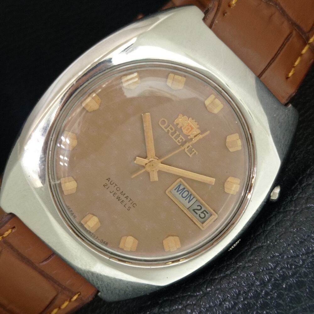 Vintage 1982 Orient Automatic Mens Silver Watch W/daydate & Gold accents